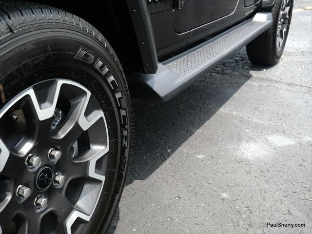 Photo of 2025 Granite Crystal Metallic Clearcoat Jeep Wrangler