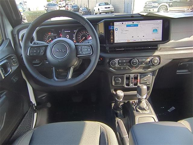 Photo of 2025 Bright White Clearcoat Jeep Wrangler