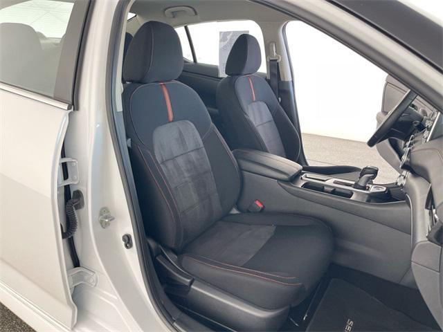 Photo of 2024 Aspen White Tricoat/Super Black Nissan Sentra