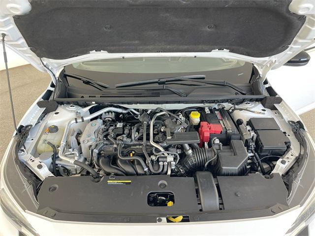 Photo of 2024 Aspen White Tricoat/Super Black Nissan Sentra