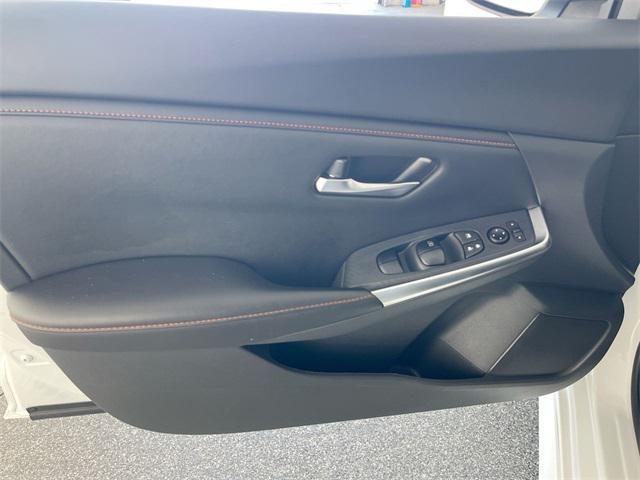 Photo of 2024 Aspen White Tricoat/Super Black Nissan Sentra