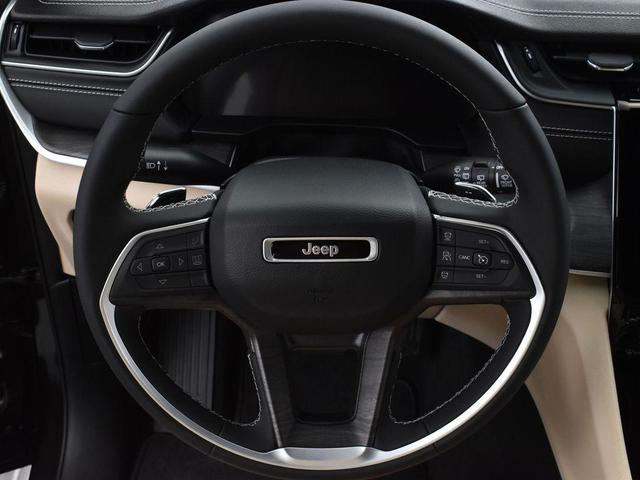 Photo of 2024 Rocky Mountain Pearlcoat Jeep Grand Cherokee