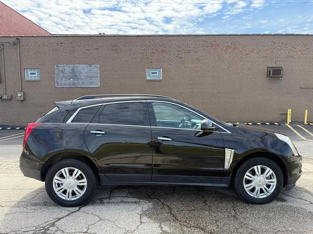 Photo of 2015 Black Raven Cadillac SRX