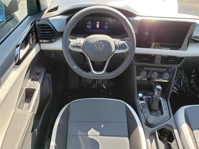 Photo of 2025 Monterey Blue Pearl Volkswagen Taos