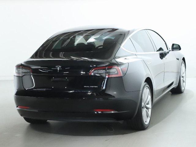 Photo of 2018 Obsidian Black Metallic Tesla Model 3