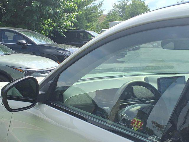Photo of 2023 Star White Metallic Tri-Coat Ford Mustang Mach-E