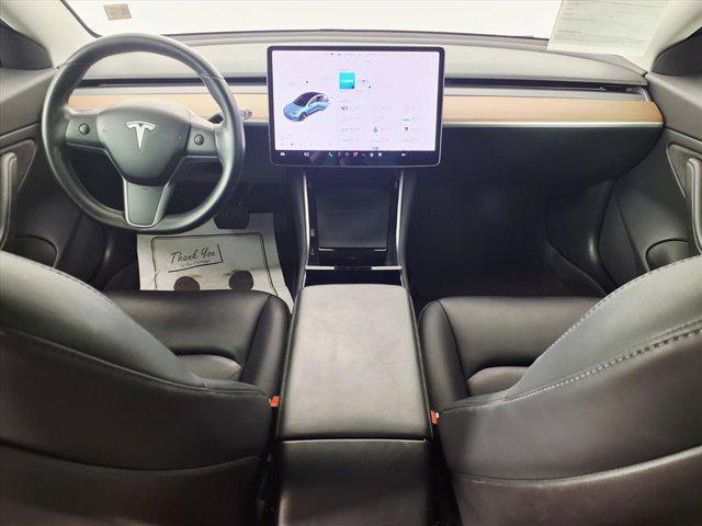 Photo of 2018 Pearl White Tesla Model 3