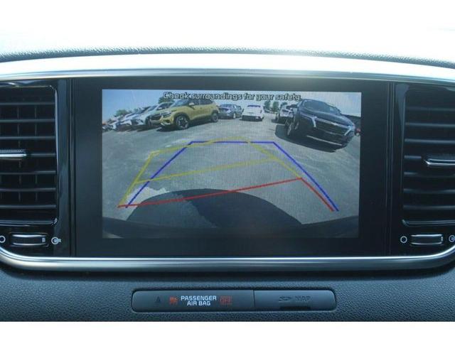 Photo of 2021 Black Cherry Kia Sportage