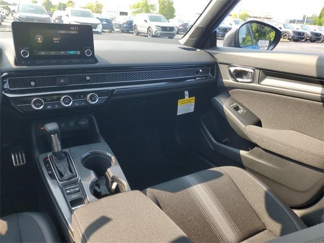 Photo of 2025 Boost Blue Pearl Honda Civic