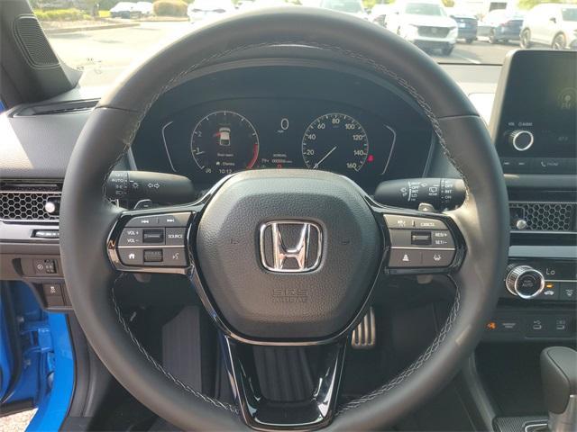 Photo of 2025 Boost Blue Pearl Honda Civic