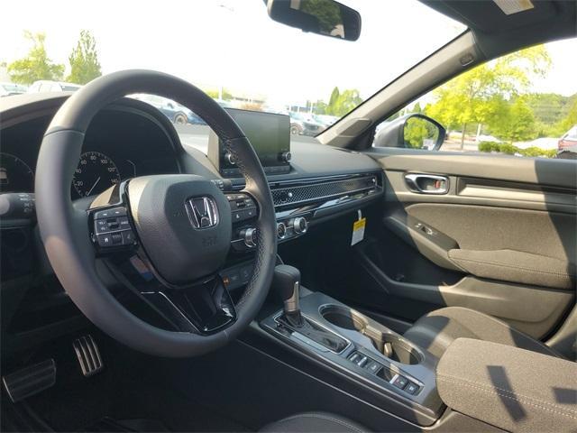 Photo of 2025 Boost Blue Pearl Honda Civic