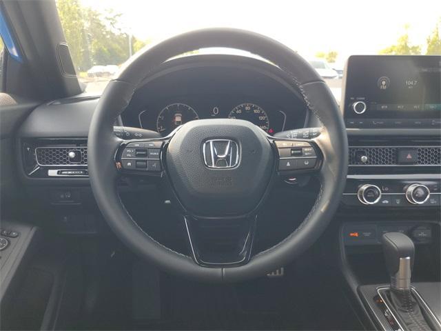 Photo of 2025 Boost Blue Pearl Honda Civic