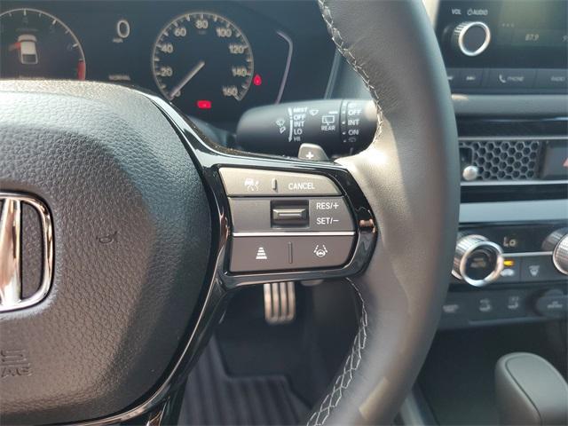 Photo of 2025 Boost Blue Pearl Honda Civic