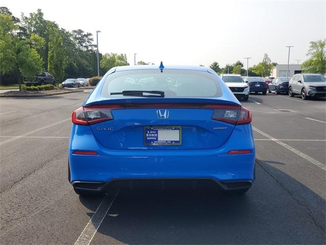 Photo of 2025 Boost Blue Pearl Honda Civic