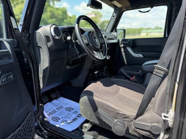 Photo of 2015 Black Clearcoat Jeep Wrangler Unlimited