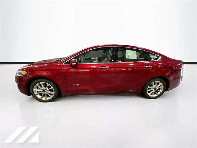 Photo of 2019 Ruby Red Metallic Tinted Clearcoat Ford Fusion Hybrid