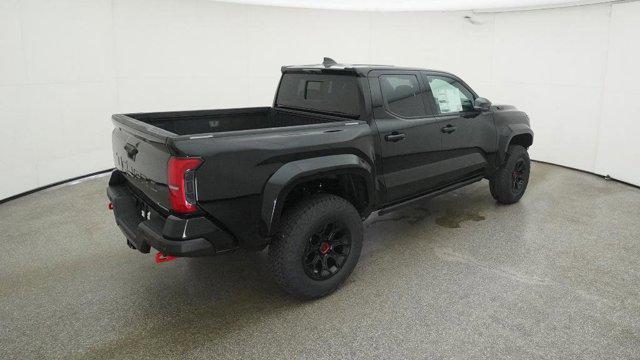 Photo of 2025 Black Toyota Tacoma