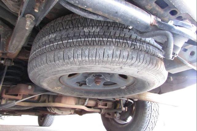 Photo of 2003 Tan GMC Yukon
