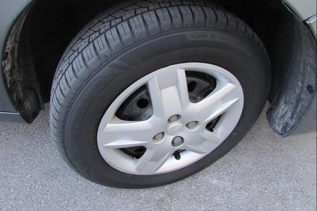 Photo of 2007 Gray Saturn Ion