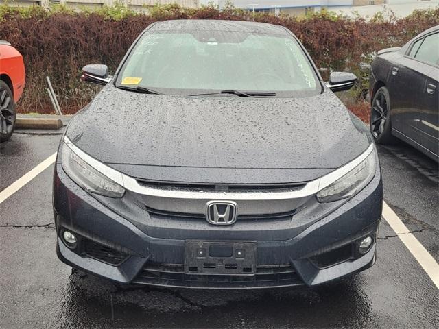 Photo of 2016 Cosmic Blue Metallic Honda Civic