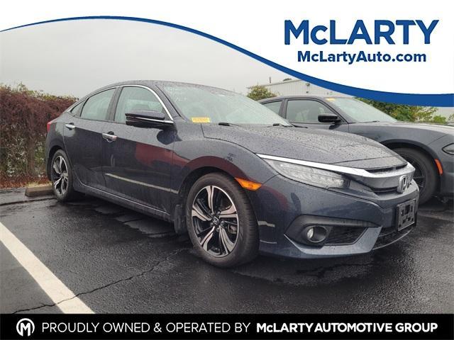 Photo of 2016 Cosmic Blue Metallic Honda Civic