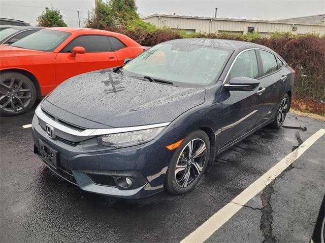 Photo of 2016 Cosmic Blue Metallic Honda Civic
