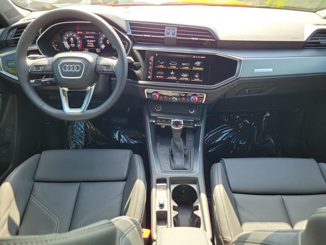 Photo of 2025 Progressive Red Metallic Audi Q3