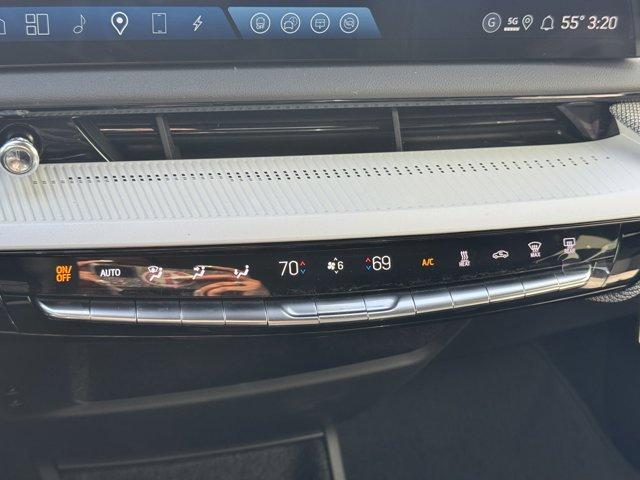 Photo of 2025 Crystal White Tri-Coat Cadillac OPTIQ
