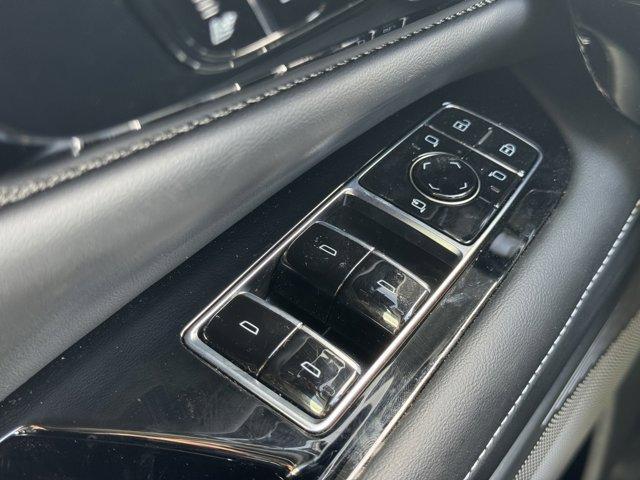 Photo of 2025 Crystal White Tri-Coat Cadillac OPTIQ
