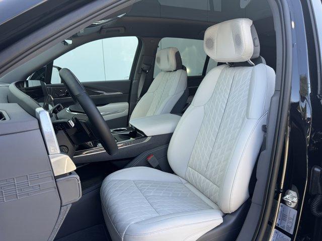 Photo of 2025 Black Raven Cadillac Escalade IQ