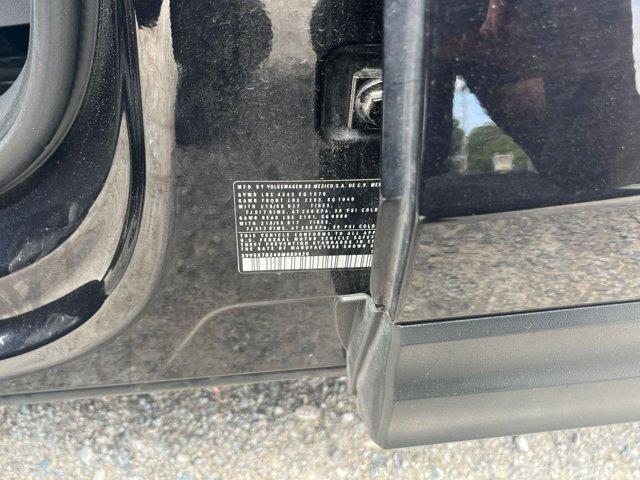 Photo of 2024 Deep Black Pearl Volkswagen Taos