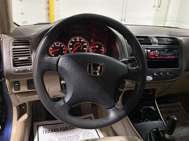 Photo of 2003 Vivid Blue Pearl Honda Civic