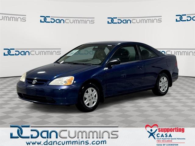 Photo of 2003 Vivid Blue Pearl Honda Civic
