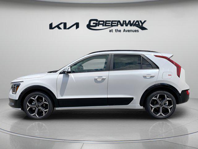 Photo of 2025 Snow White Pearl Kia Niro