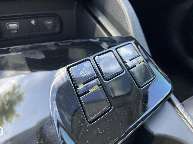Photo of 2025 Gravity Gray Kia Sportage Hybrid