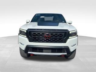 Photo of 2023 Glacier White Nissan Frontier