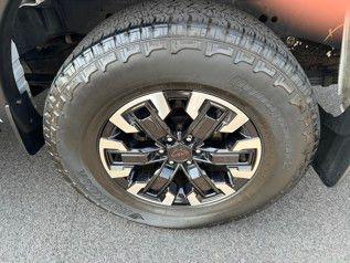 Photo of 2023 Glacier White Nissan Frontier