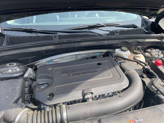 Photo of 2024 Ebony Twilight Metallic Buick Envision