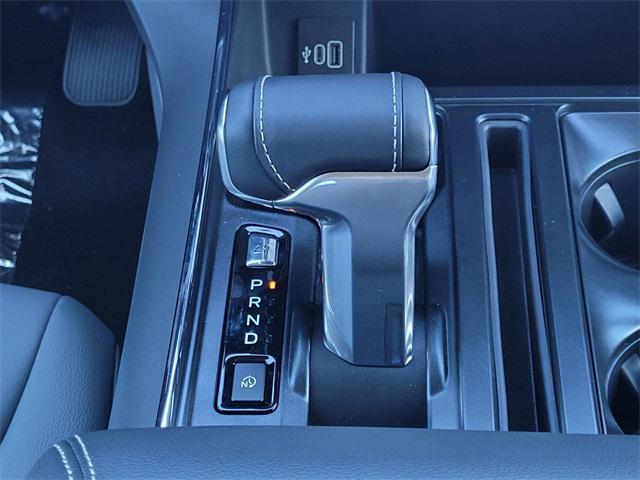 Photo of 2025 Agate Black Metallic Ford F-150 Lightning
