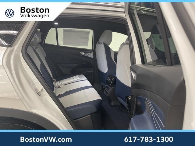 Photo of 2025 Opal White Pearl W / Black Roof Volkswagen ID.4