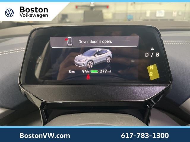 Photo of 2025 Opal White Pearl W / Black Roof Volkswagen ID.4