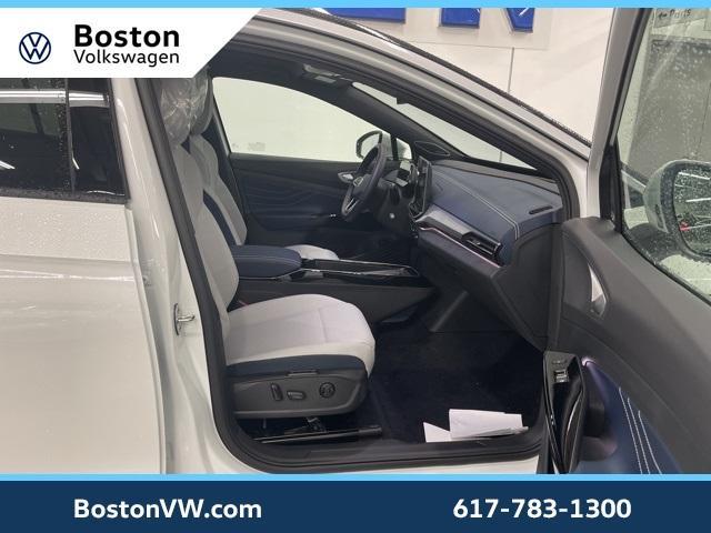 Photo of 2025 Opal White Pearl W / Black Roof Volkswagen ID.4