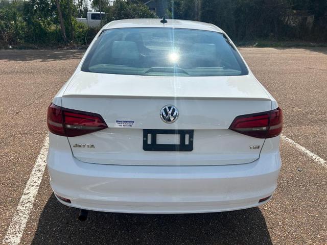 Photo of 2016 White Volkswagen Jetta