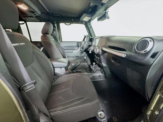 Photo of 2015 Tank Clearcoat Jeep Wrangler Unlimited