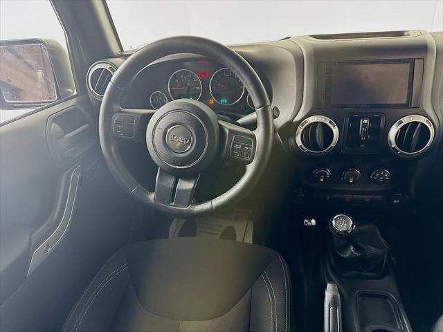 Photo of 2015 Tank Clearcoat Jeep Wrangler Unlimited