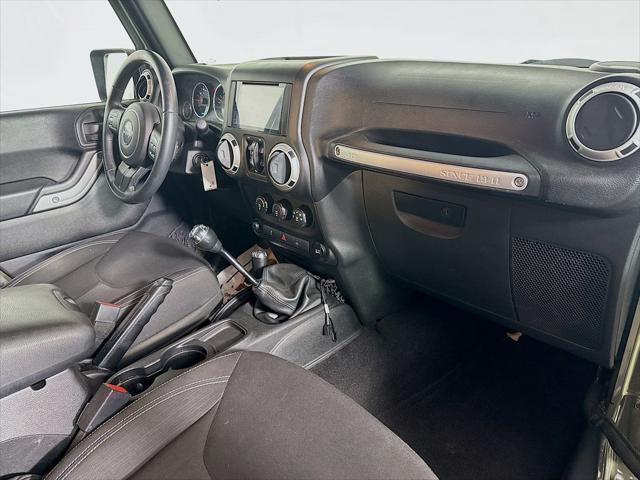 Photo of 2015 Tank Clearcoat Jeep Wrangler Unlimited