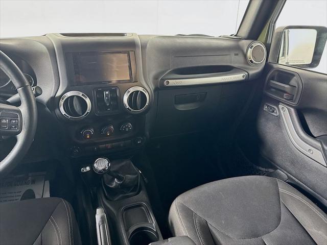 Photo of 2015 Tank Clearcoat Jeep Wrangler Unlimited