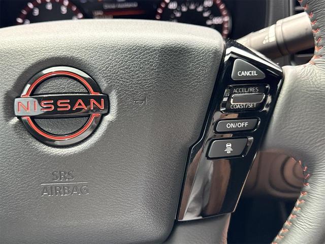 Photo of 2024 Bluestone Pearl Nissan Frontier