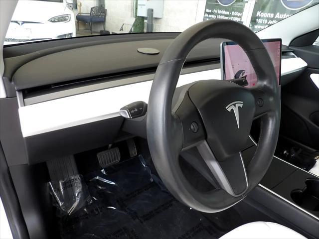 Photo of 2018 Pearl White Multi-Coat Tesla Model 3