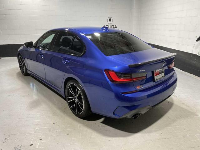 Photo of 2022 Portimao Blue Metallic BMW 330
